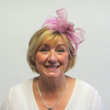 Rose bow fascinator with feathers