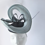 Parasisal Swirl button fascinator with Goose Biot Feathers and Spines