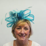 Bow with fringe and coq feathers fascinator