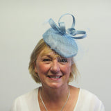 Pillar box fascinator with netting, feathers and bows