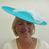 Saucer hatinator with Crinoline bow and feather flowers