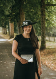 Black and silver upturned brim hatinator with silver leaver leaves and broach detail