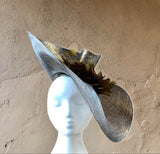 Beautiful swirl hatinator with feathers