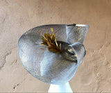 Beautiful swirl hatinator with feathers