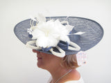 Saucer hatinator with feather flowers and spines