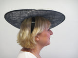 Saucer hatinator with feather flowers and spines