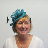 Long teardrop fascinator with leaves and ribbon with bead seeds