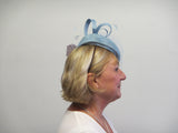 Pillar box fascinator with netting, feathers and bows