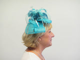 Bow with fringe and coq feathers fascinator