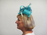 Bow with fringe and coq feathers fascinator