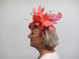 Saucer fascinator with feather flowers and crinoline