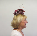 Bow fascinator with feather flowers and spine