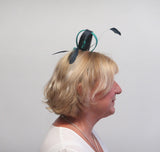 Bow fascinator with Dalmonte and feathers