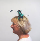 Bow fascinator with Dalmonte and feathers