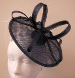 Disc with ribbons and swirl fascinator