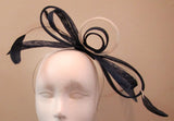 Bow fascinator with Dalmonte and feathers