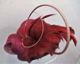 Bow fascinator with feather flowers and spine