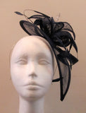Long teardrop fascinator with leaves and ribbon with bead seeds