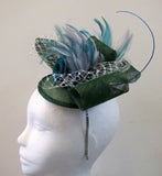 Bow and rose fascinator with lace netting and spine
