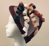 Teardrop with sinamay flower and ribbons with dalmonte flower centre