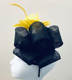 Bow fascinator with feather flowers and spine