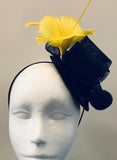 Bow fascinator with feather flowers and spine