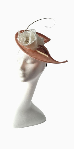 Beautiful halfmoon pink fascinator with white roses and a spine