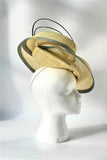 Primrose and silver swirl hatinator with feather flower