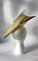 Primrose and silver swirl hatinator with feather flower