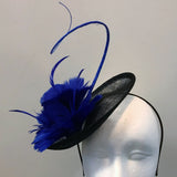 Small saucer fascinator with feather flowers and spine