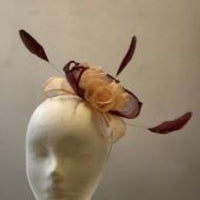 Small leaves and roses with feathers fascinator