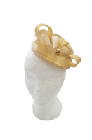 Pale yellow and ivory fascinator with bows and diamante detail