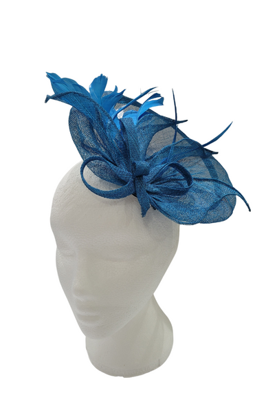 Turquoise disc fascinator with bow and feathers