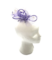 Small satin Lilac bow fascinator with netting and feathers