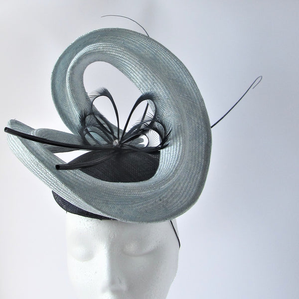 Parasisal Swirl button fascinator with Goose Biot Feathers and Spines