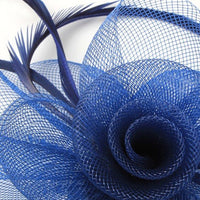 Crinoline Rose with biot feather fascinator on a clip and brooch pin