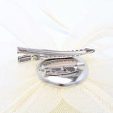 Crinoline Rose with biot feather fascinator on a clip and brooch pin