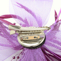 Crinoline looped bow and feather and pearls fascinator on a clip and pin