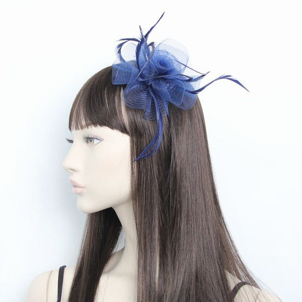 Crinoline flower fascinator with biot feathers on an aliceband