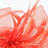 Looped crinoline fascinator with pearls and biot feathers on an aliceband.