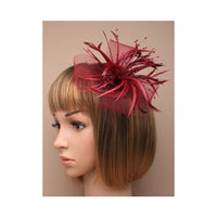Crinoline looped bow and feather and pearls fascinator on a clip and pin