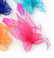 Bow Fascinator On A Clear Comb with coq feathers