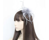 Crinoline flower fascinator with biot feathers on an aliceband