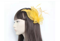Bow Fascinator On A Clear Comb with coq feathers