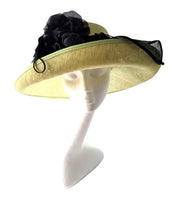 Hat 9 - Beautiful lime green hat with black flowers and leaf detail.