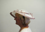 Hatinator with two tone spirals and flowers with pearls