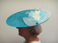 Saucer hatinator with Crinoline bow and feather flowers