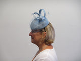 Pillar box fascinator with netting, feathers and bows