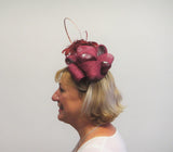 Bow fascinator with feather flowers and spine