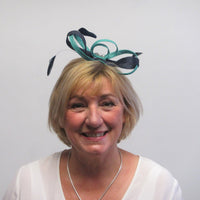 Bow fascinator with Dalmonte and feathers